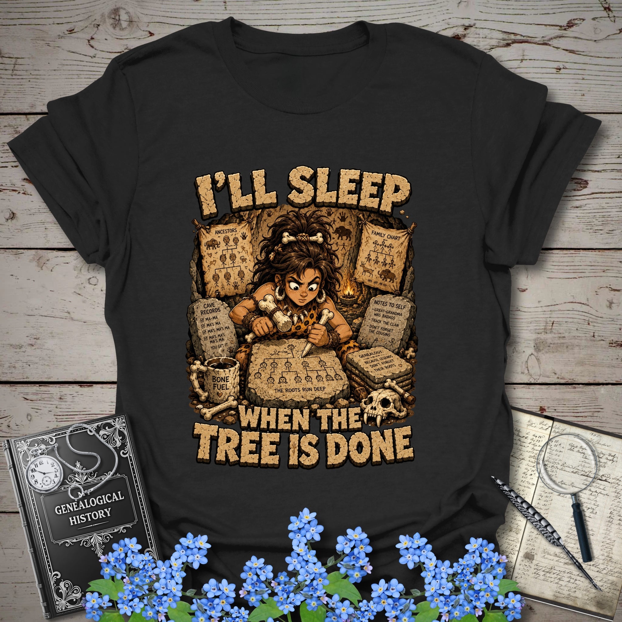 I’ll Sleep When the Tree Is Done – Cavewoman Edition T-Shirt in Black by Genealogy Keepsakes