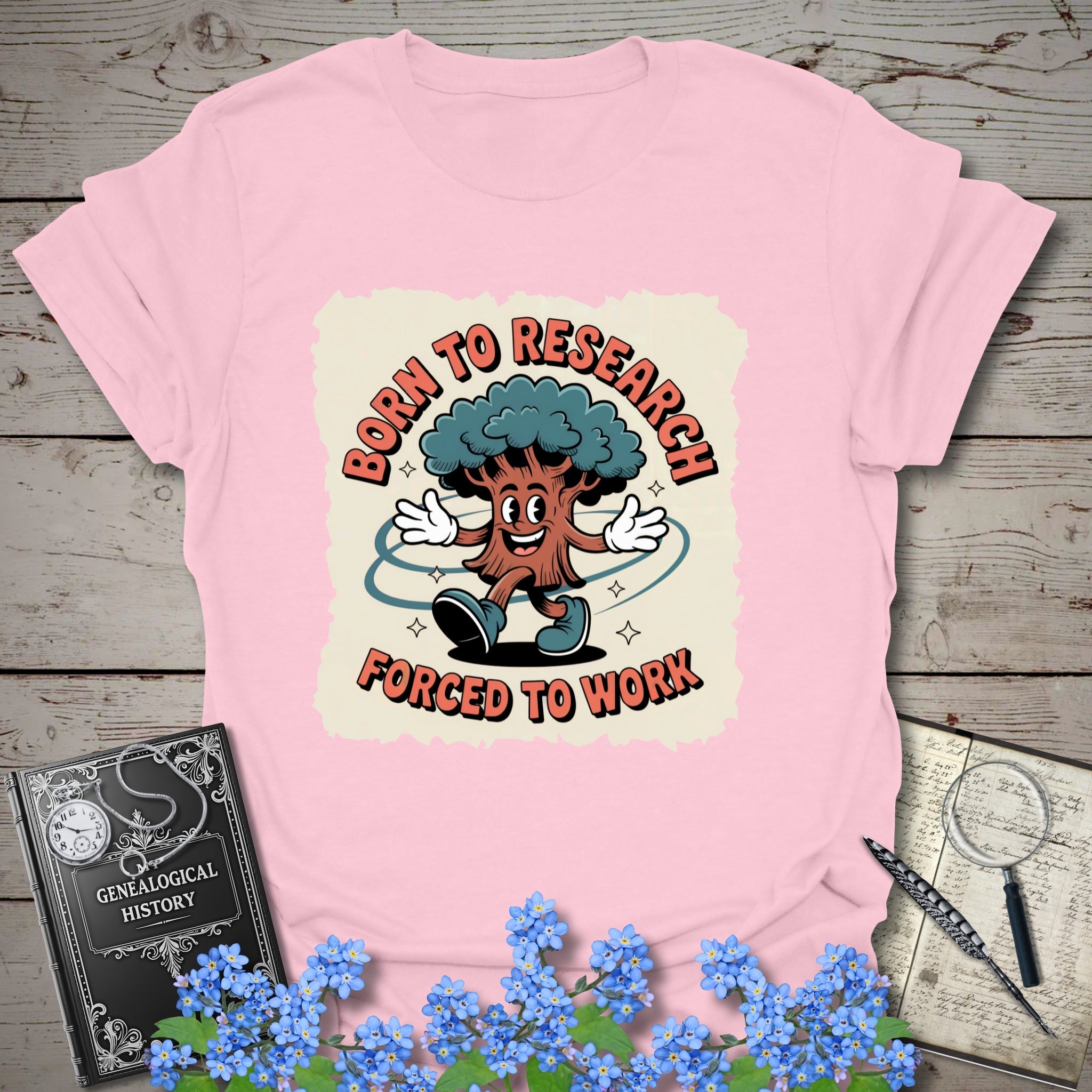 Born To Research, Forced To Work T-Shirt in Light Pink by Genealogy Keepsakes