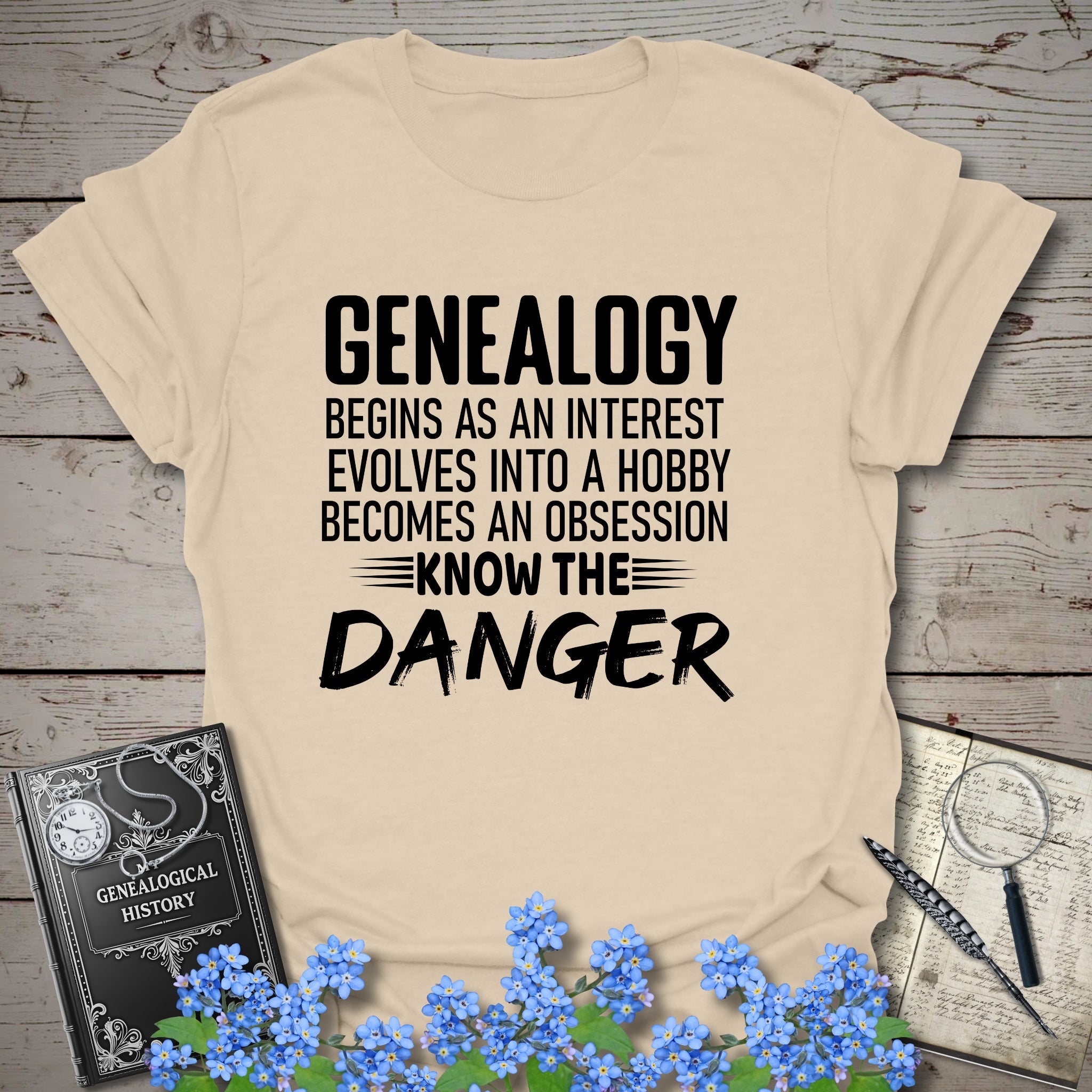 Genealogy Begins As An Interest T-Shirt in Sand by Genealogy Keepsakes
