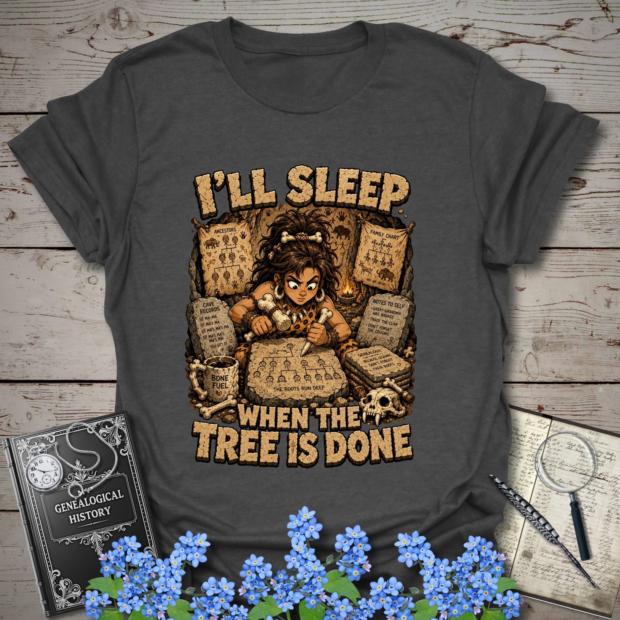 I’ll Sleep When the Tree Is Done – Cavewoman Edition T-Shirt in Dark Heather by Genealogy Keepsakes