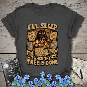 I’ll Sleep When the Tree Is Done – Cavewoman Edition T-Shirt in Dark Heather by Genealogy Keepsakes