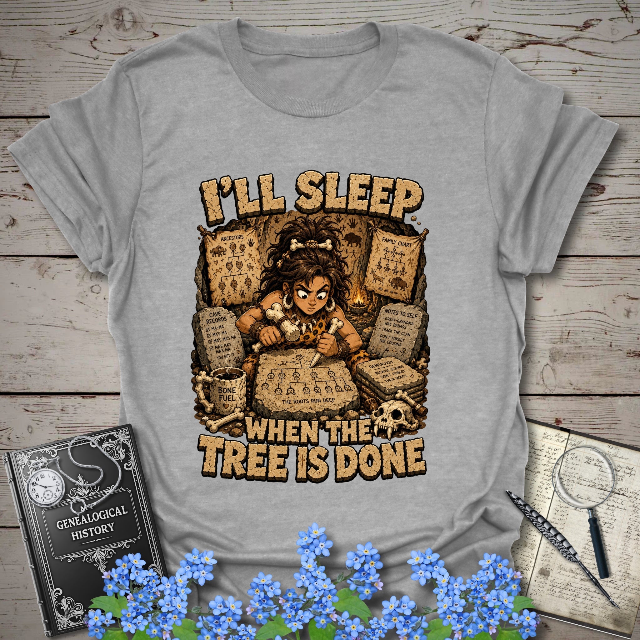 I’ll Sleep When the Tree Is Done – Cavewoman Edition T-Shirt in Sport Grey by Genealogy Keepsakes