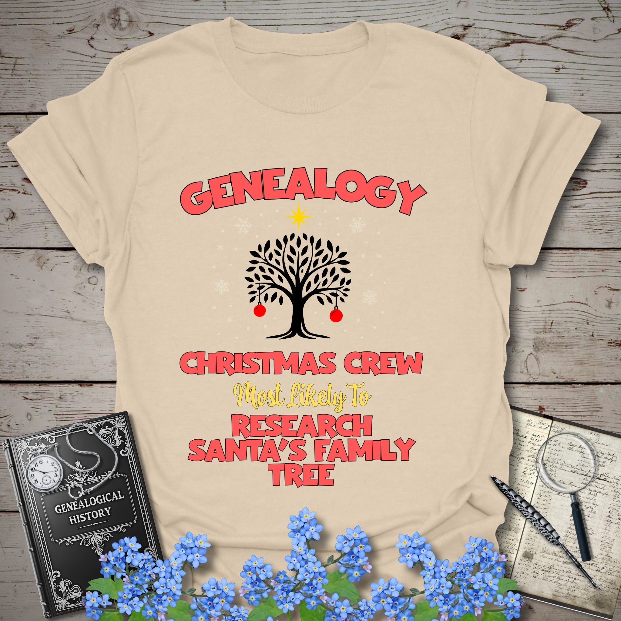 Most Likely To Research Santa's Family Tree T-Shirt in Sand by Genealogy Keepsakes