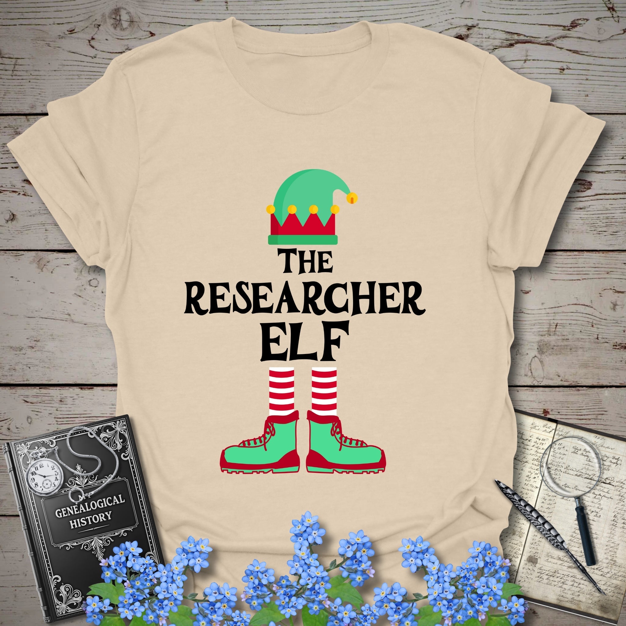 The Researcher Elf T-Shirt in Sand by Genealogy Keepsakes