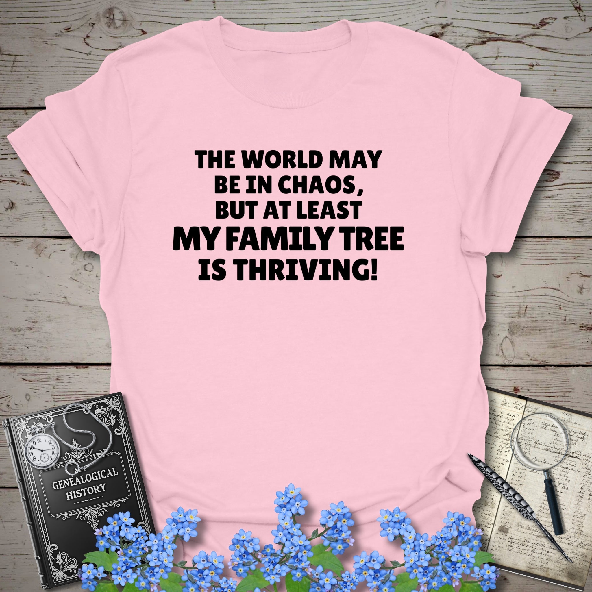 The World May Be In Chaos T-Shirt in Light Pink by Genealogy Keepsakes